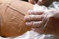 pexels-photo-18127464-18127464 A person receiving a relaxing body wrap treatment as part of a spa therapy session.
