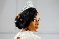 pexels-photo-2062542-2062542 Stunning portrait of a woman wearing a tiara and elegant bridal gown, exuding elegance and grace.